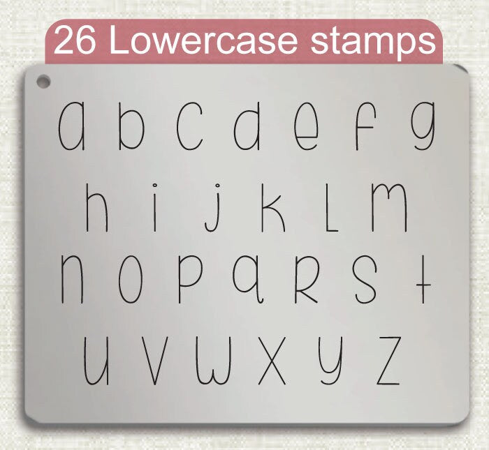 Beneath Metal Letter Stamps, full Alphabet.
