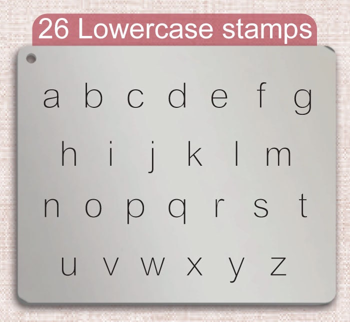 Arial金属字母邮票，完整的字母表。