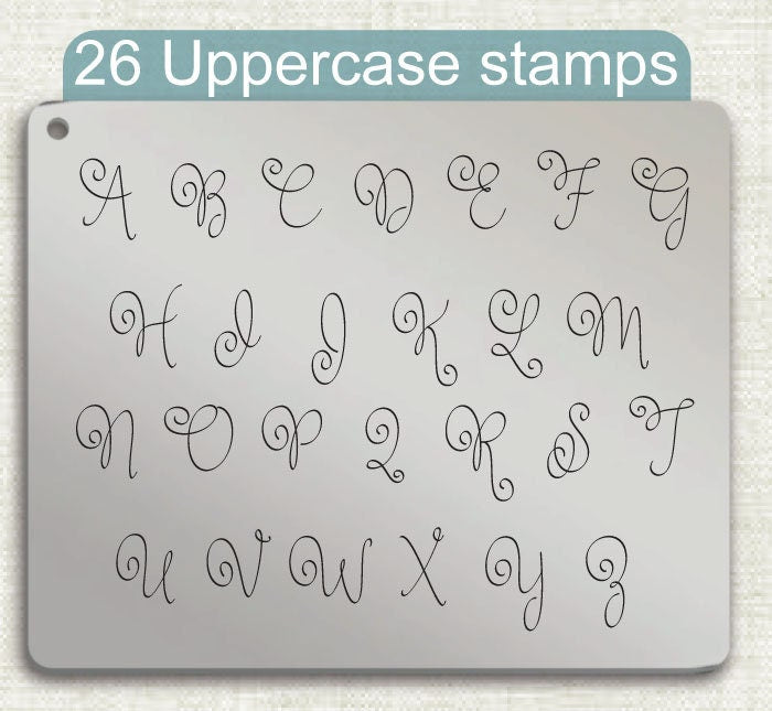 带走金属字母邮票，完整的字母。