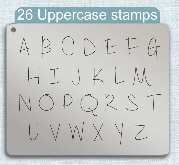 腰果苹果金属邮票，完整的字母表。